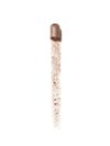 A swatch of ILIA eyeshadow stick in shimmering taupe, showing its smooth texture.