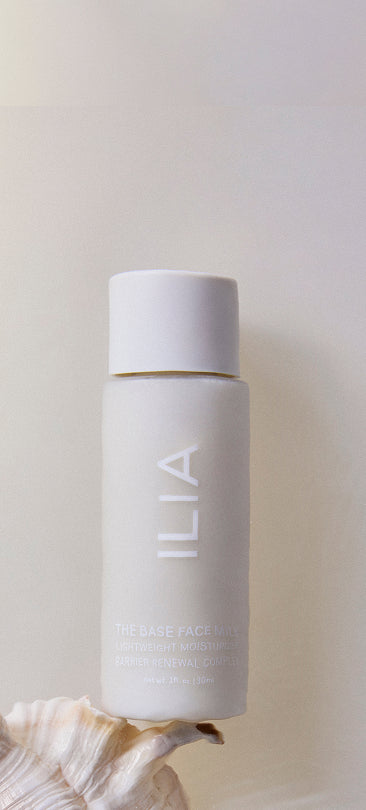 ILIA's mini Face Milk on a neutral background to support free mini Face Milk with Sun Serum orders.