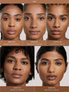 Five models with different skin tones and complexion displayed with Complexion Stick applied and labeled on a beige background.