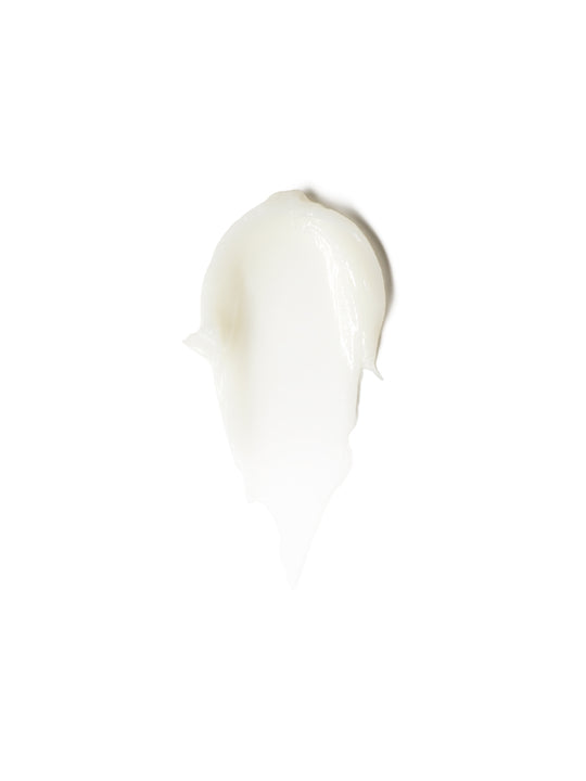 A smooth, glossy white product swatch showing its rich texture.