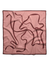 Pink ILIA Limited Edition scarf with abstract design on a white background
